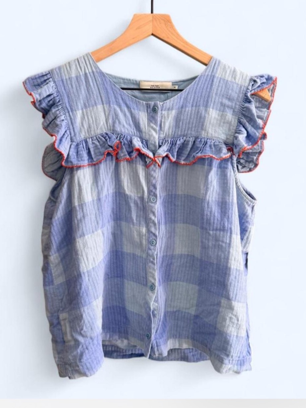 The tiny big sister Light Blue Ruffle Button-Front top with Contrast Trim
